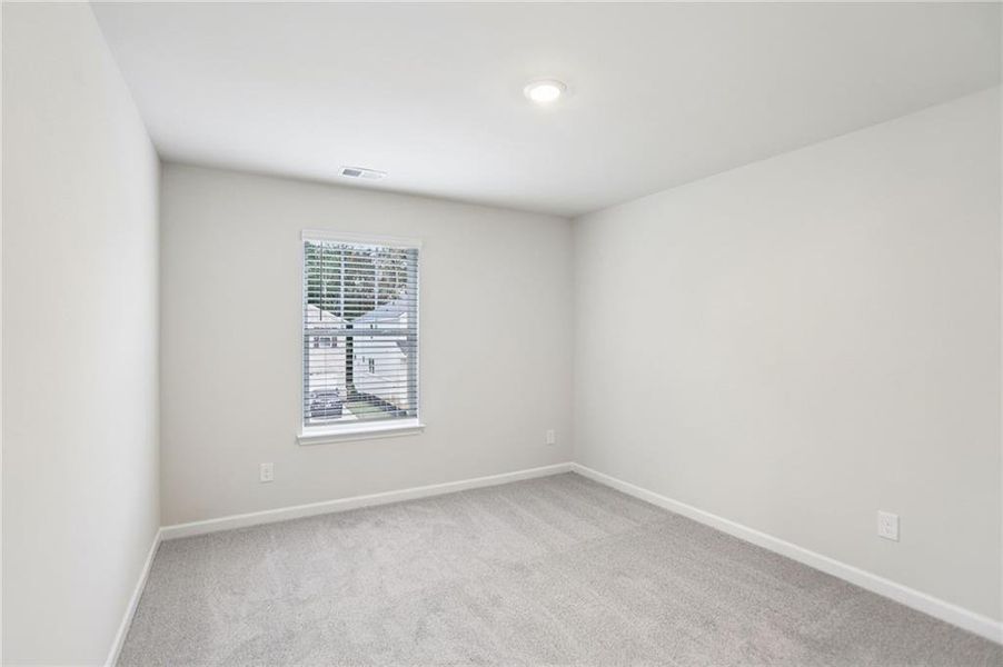 Spacious, unfurnished interior of a new home in Westmont Preserve, Powder Springs (Image 52).