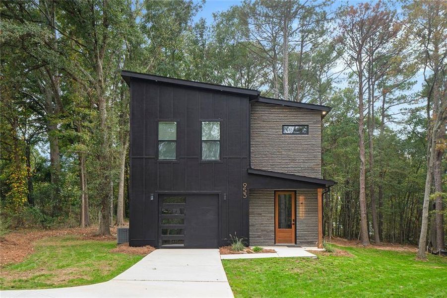 Front exterior of a new home in , Conyers, GA, highlighting curb appeal (Image 2). Front exterior of a new home in , Conyers, GA, highlighting curb appeal (Image 2).