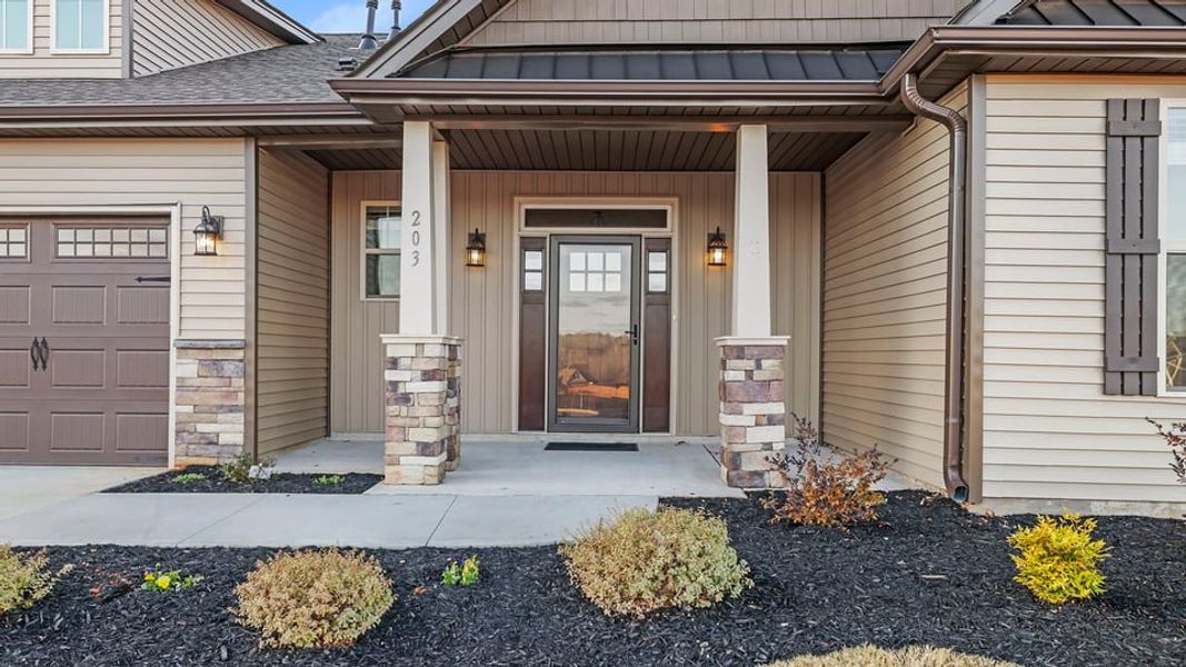 Exterior details and patio area of a home in Palmetto Valley, Anderson (Image 3).