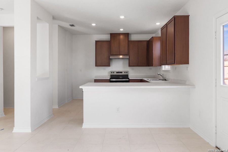Furnished interior view inside a new home in Southton Cove, Elmendorf (Image 9). Furnished interior view inside a new home in Southton Cove, Elmendorf (Image 9).