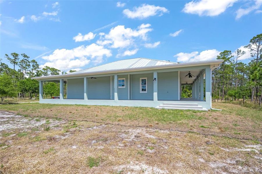 Exterior details and patio area of a home in , North Port (Image 21).