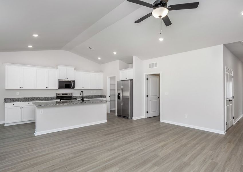 The kitchen is open to the living area