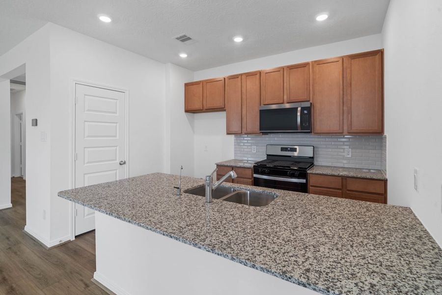 Furnished interior view inside a new home in Mustang Ridge, Magnolia (Image 6).