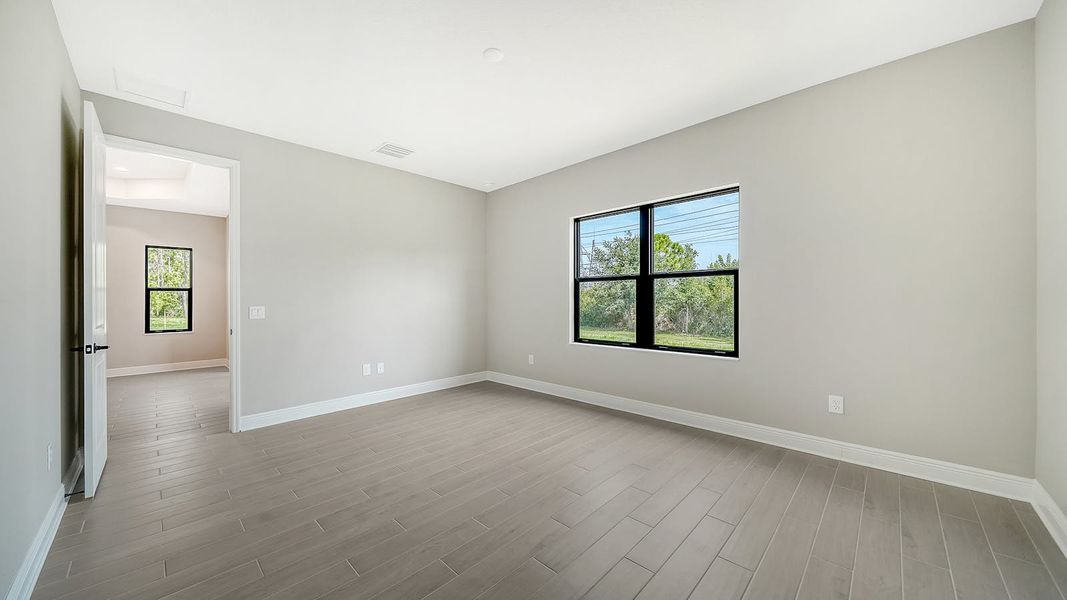 Spacious, unfurnished interior of a new home in Vicenza Real Estate and Homes for Sale in North Venice, FL - Neal Communities, Venice (Image 30).