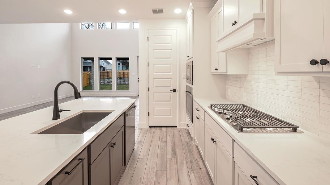 Furnished interior view inside a new home in 6 Creeks, Kyle (Image 12).