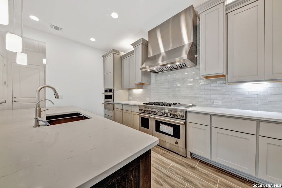 Furnished interior view inside a new home in El Sonido at Campanas, San Antonio (Image 11).