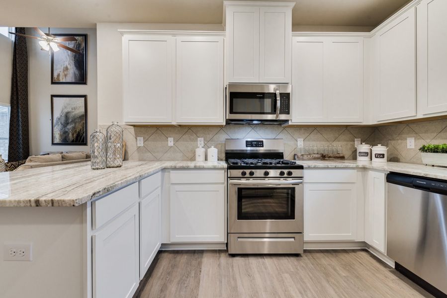 Representative furnished interior of a home built from the Floor Plan 2102 by Colina Homes in Sunterra, Katy (Image 27). Representative furnished interior of a home built from the Floor Plan 2102 by Colina Homes in Sunterra, Katy (Image 27).