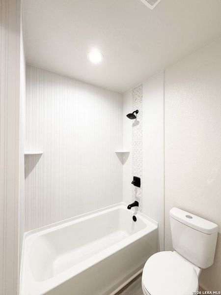 Furnished interior view inside a new home in , Devine (Image 7).