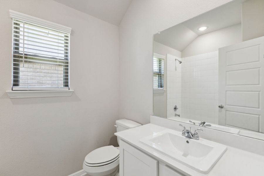 Bathroom in the Diamond home plan by Trophy Signature Homes – REPRESENTATIVE PHOTO