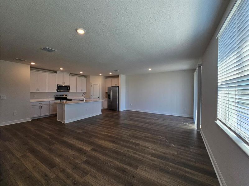 Spacious, unfurnished interior of a new home in The Reserve at Hammock Oaks - Signature Series, Lady Lake (Image 17).