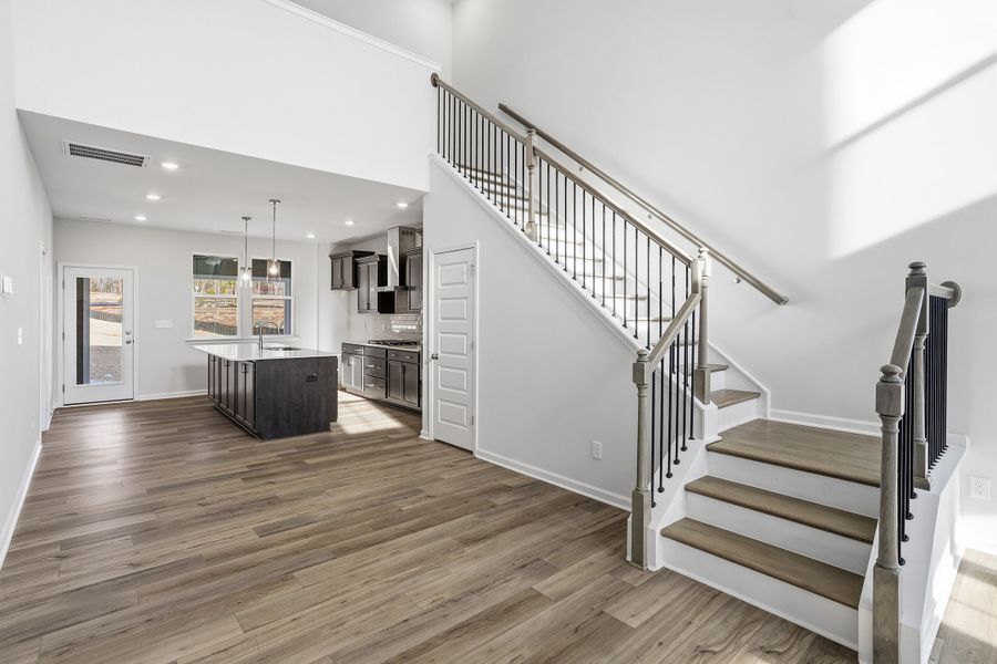 Furnished interior view inside a new home in Ovation at Sweetbrier, Durham (Image 14).