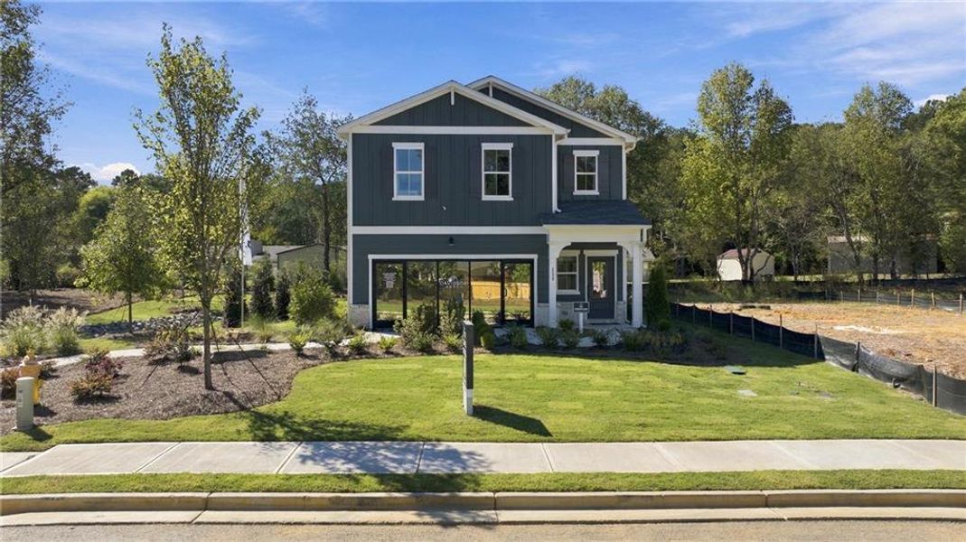 Front exterior of a new home in Greene Farm, Cartersville, GA, highlighting curb appeal (Image 2). Front exterior of a new home in Greene Farm, Cartersville, GA, highlighting curb appeal (Image 2).