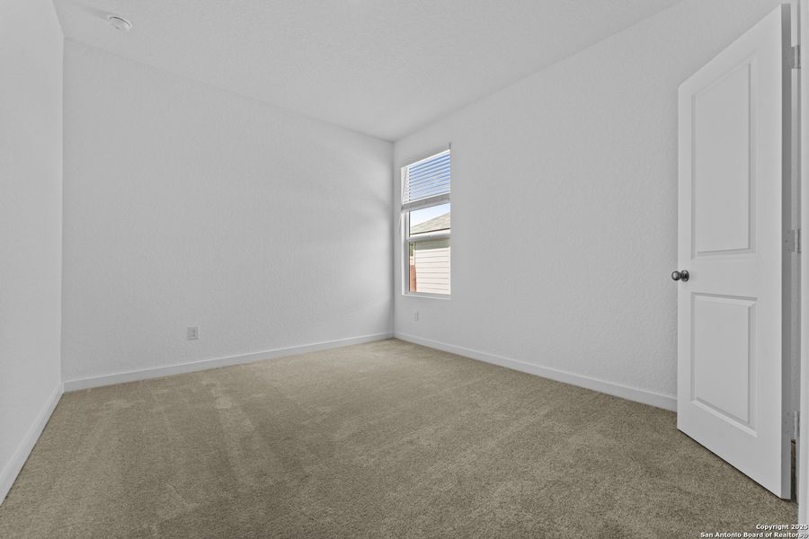 Spacious, unfurnished interior of a new home in Waterwheel: Coastline Collection, San Antonio (Image 15).