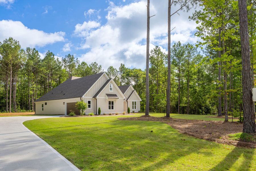 Front exterior of a new home in Flint Farms, Concord, GA, highlighting curb appeal (Image 31).