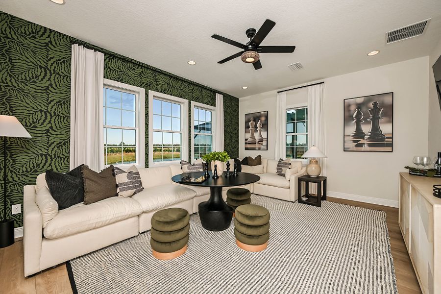 Representative furnished interior of a home built from the Key Largo II by Homes by WestBay in Barrington Preserve, Brandon (Image 7).