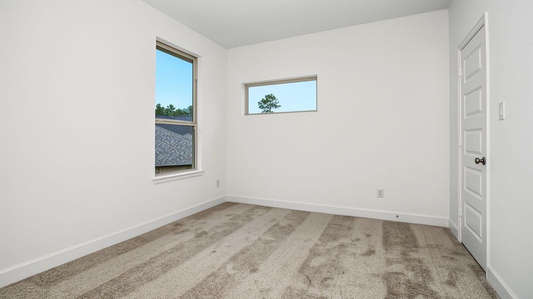 Spacious, unfurnished interior of a new home in The Woodlands Hills, Willis (Image 10).