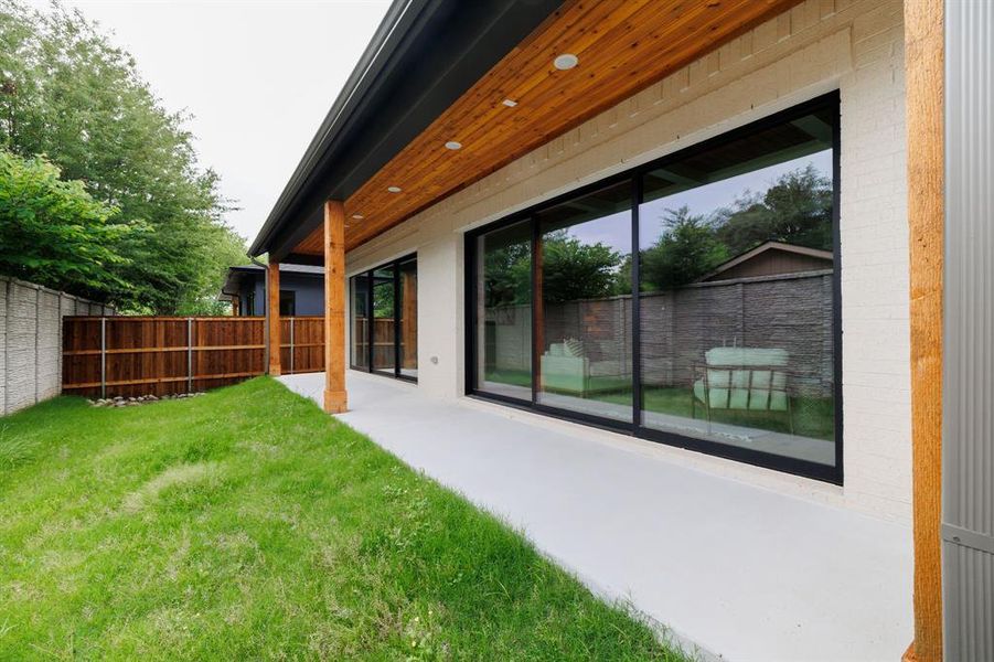 Exterior details and patio area of a home in Dove Station, Grapevine (Image 4).