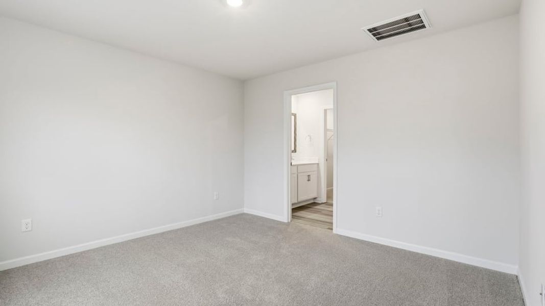 Spacious, unfurnished interior of a new home in Bentley Park, Greenwood (Image 23).