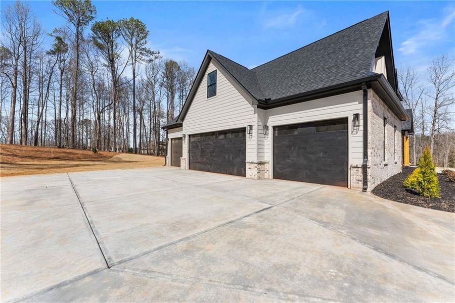 Front exterior of a new home in , Hoschton, GA, highlighting curb appeal (Image 39). Front exterior of a new home in , Hoschton, GA, highlighting curb appeal (Image 39).