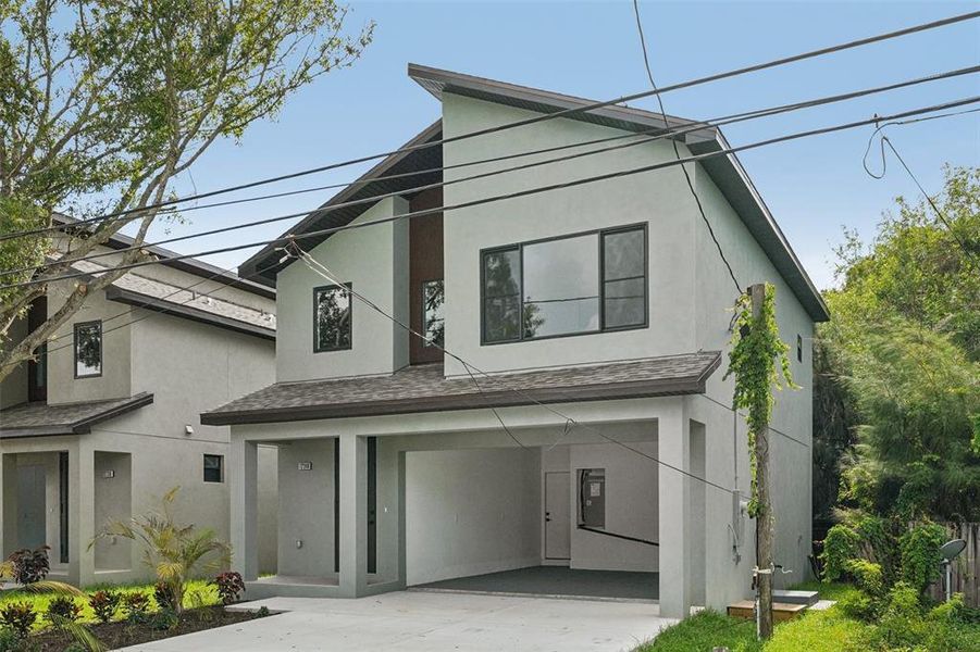 Front exterior of a new home in , Largo, FL, highlighting curb appeal (Image 21).