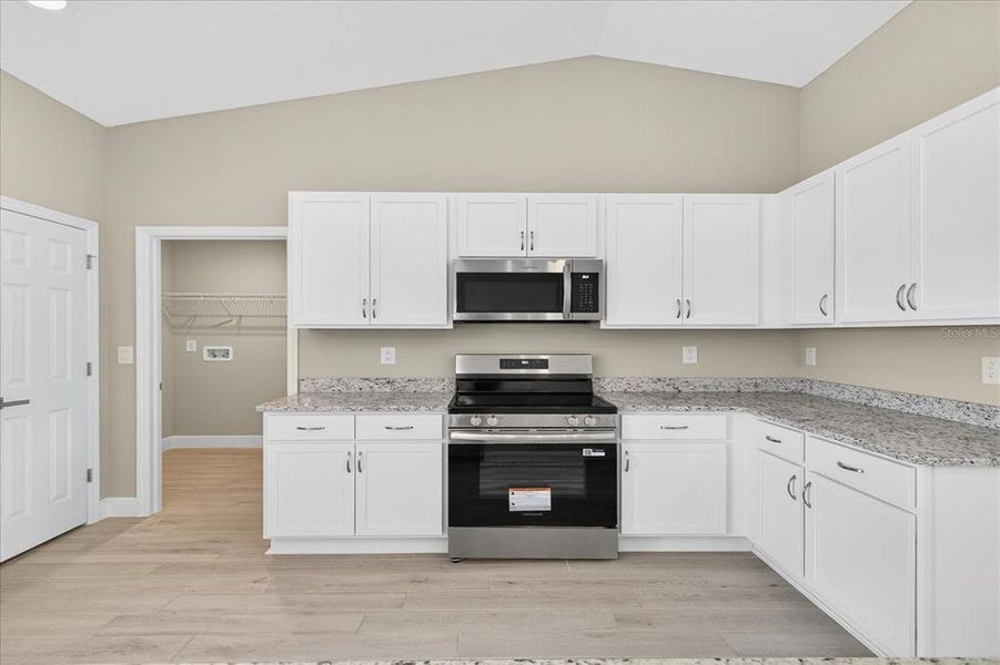Furnished interior view inside a new home in , Weeki Wachee (Image 13).