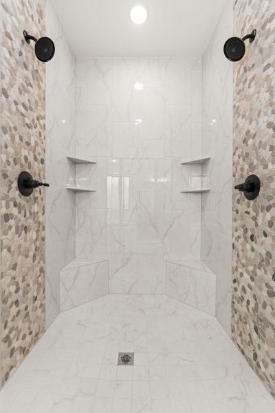 Full bathroom with a tile shower