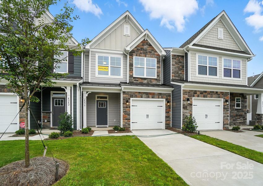 Front exterior of a new home in Harrisburg Village, Harrisburg, NC, highlighting curb appeal (Image 1). Front exterior of a new home in Harrisburg Village, Harrisburg, NC, highlighting curb appeal (Image 1).