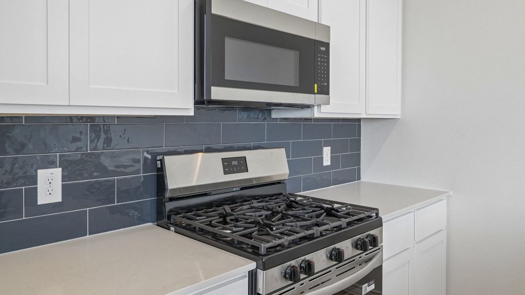Image 16 representing the Cambridge by D.R. Horton in Magnolia at Legacy Hills, Celina, TX.