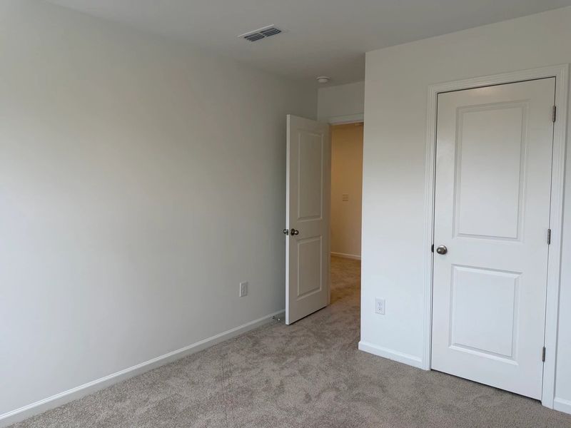 Bed 3 - Neutral tones and clean lines with modern comfort.