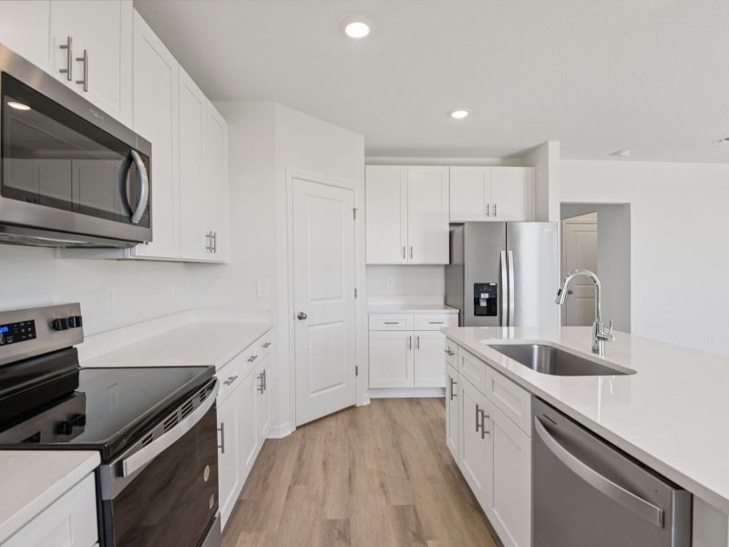 Furnished interior view inside a new home in Oakfield Trails - Classic Series, Parrish (Image 3).