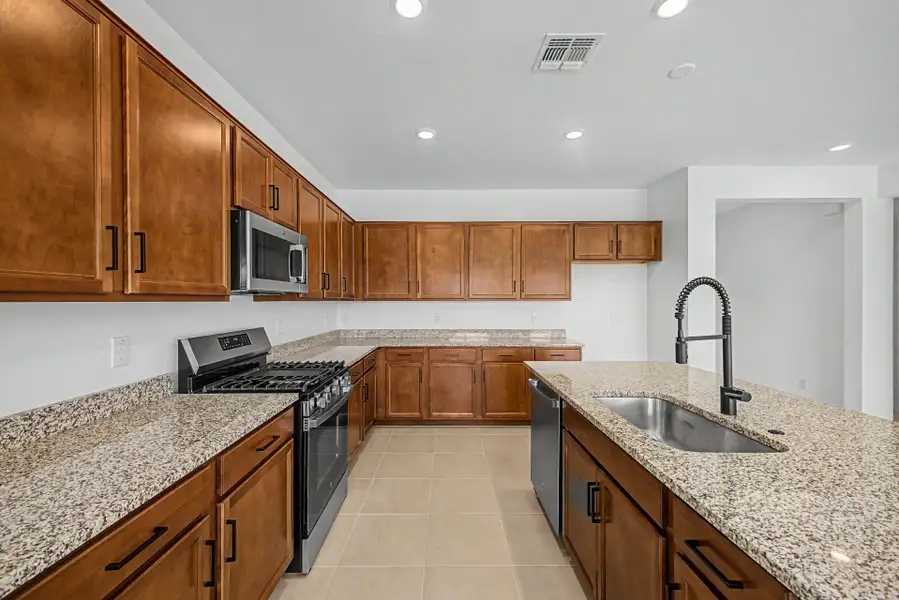 Furnished interior view inside a new home in Frontera, Surprise (Image 4).