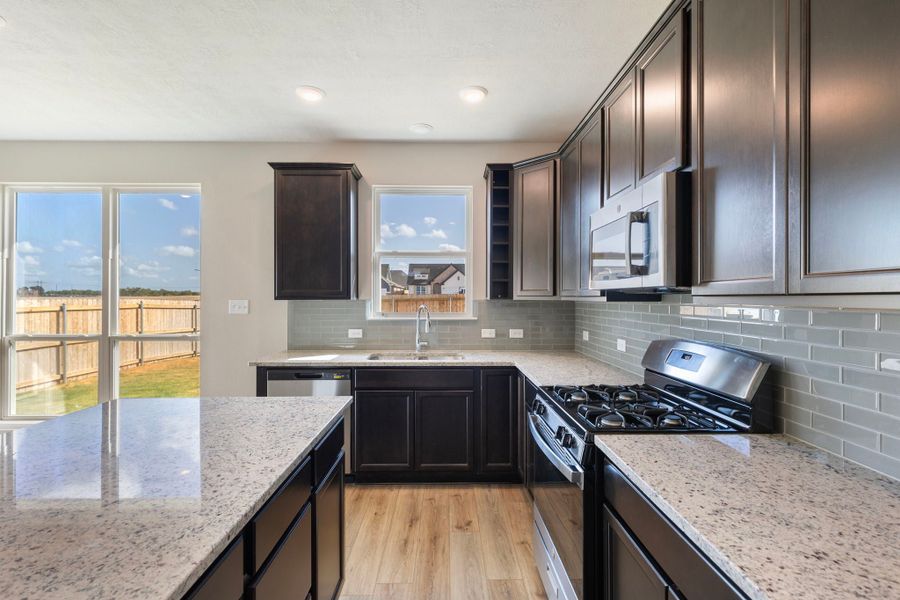 Representative furnished interior of a home built from the The 1613 by Stylecraft Builders in Arroyo Ranch, Seguin (Image 8).