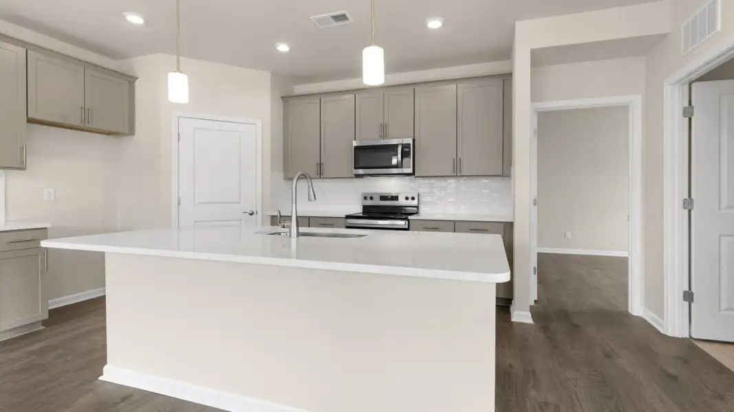 Furnished interior view inside a new home in The Villas at Galvins Ridge, Sanford (Image 7).