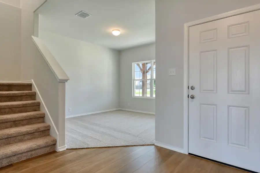 Representative unfurnished interior of a home built from the Alexis by Ashton Woods in Hennersby Hollow, San Antonio (Image 4).