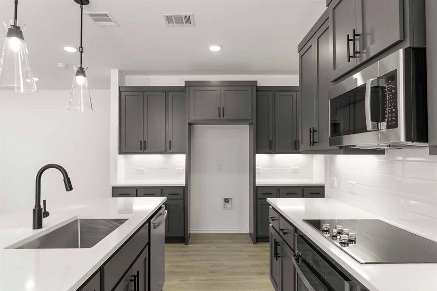 Furnished interior view inside a new home in Sereno Oaks at Buckner Terrace, Dallas (Image 3). Furnished interior view inside a new home in Sereno Oaks at Buckner Terrace, Dallas (Image 3).