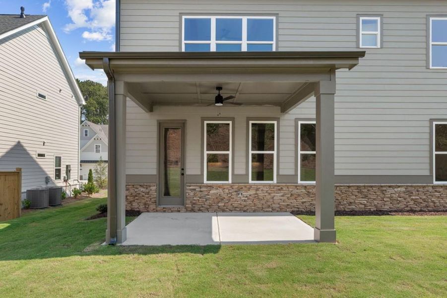 Front exterior of a new home in Hillshire, Cumming, GA, highlighting curb appeal (Image 28). Front exterior of a new home in Hillshire, Cumming, GA, highlighting curb appeal (Image 28).