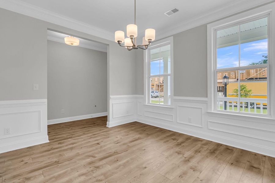 Spacious, unfurnished interior of a new home in Tidewater at Lakes of Cane Bay, Summerville (Image 18).