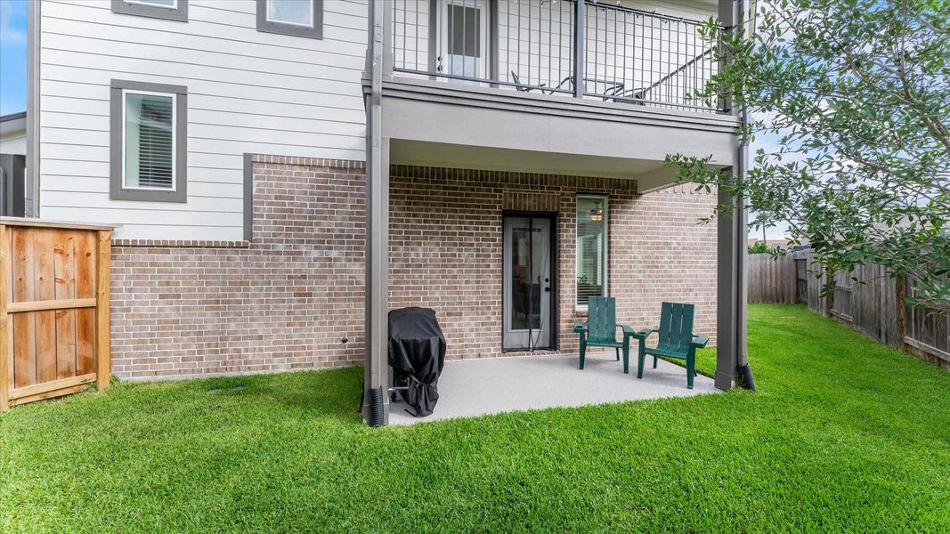Exterior details and patio area of a home in Balmoral, Humble (Image 28).