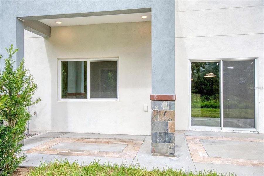 Exterior details and patio area of a home in , Davenport (Image 4).