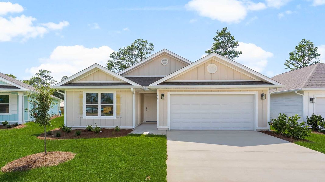 Front exterior of a new home in Ashton Park Phase III, Freeport, FL, highlighting curb appeal (Image 2).