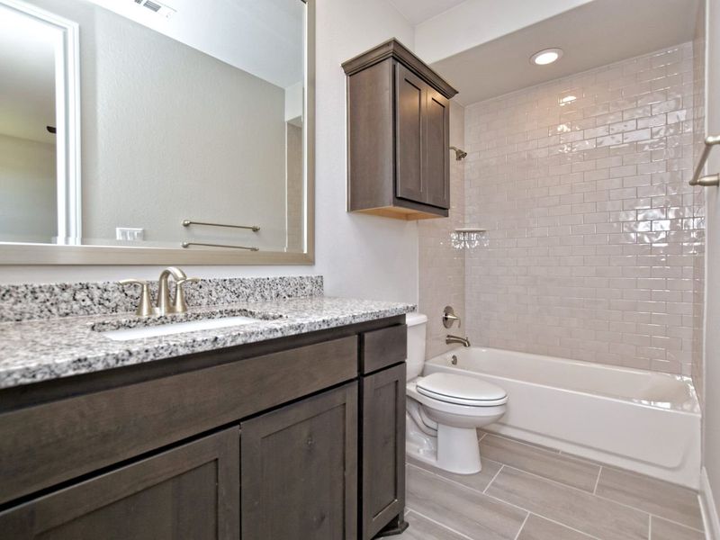 Representative furnished interior of a home built from the Avalon by Giddens Homes in Scofield Farms Estates, Georgetown (Image 101).