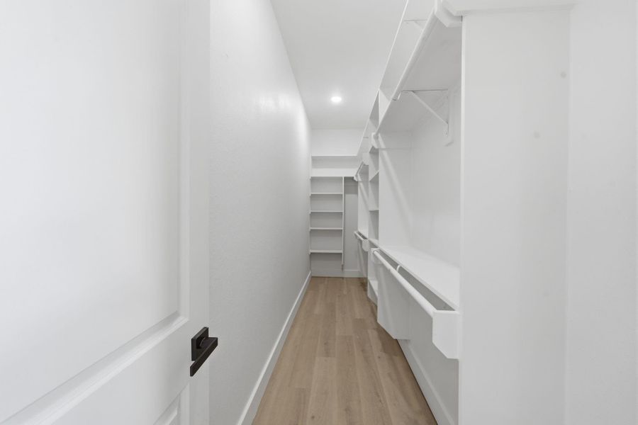 Photos don't do the primary closet justice...it is massive!