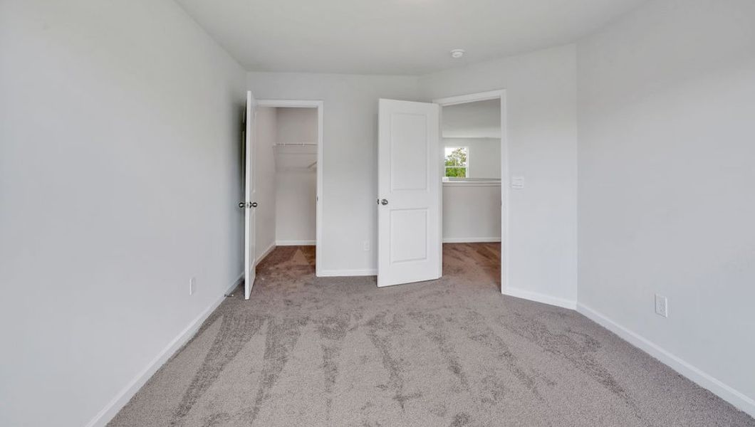 Spacious, unfurnished interior of a new home in Indigo Preserve Townhomes, Leland (Image 21).