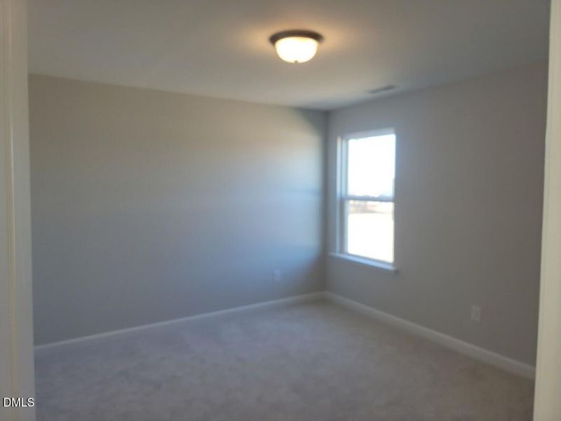 Spacious, unfurnished interior of a new home in Tobacco Road, Angier (Image 32).