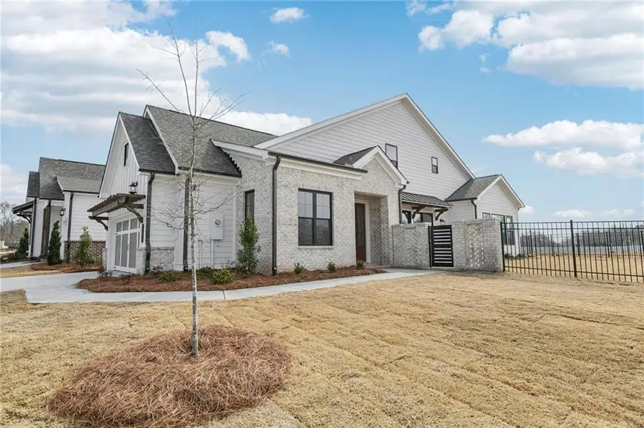 Front exterior of a new home in Aberdeen, Hoschton, GA, highlighting curb appeal (Image 25).
