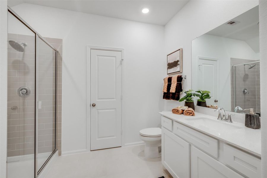 Furnished interior view inside a new home in Bridgeland, Cypress (Image 23).