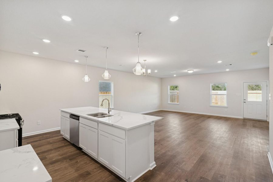 The Crawford- Kitchen into Family Room. Sample image for illustration; upgrades, options, and colors may vary. The Crawford- Kitchen into Family Room. Sample image for illustration; upgrades, options, and colors may vary.