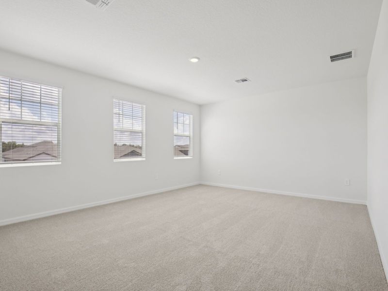 Spacious, unfurnished interior of a new home in Coasterra - Reserve Series, Palmetto (Image 14).