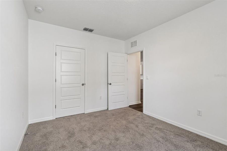 Spacious, unfurnished interior of a new home in Hamilton Bluff, Haines City (Image 27).