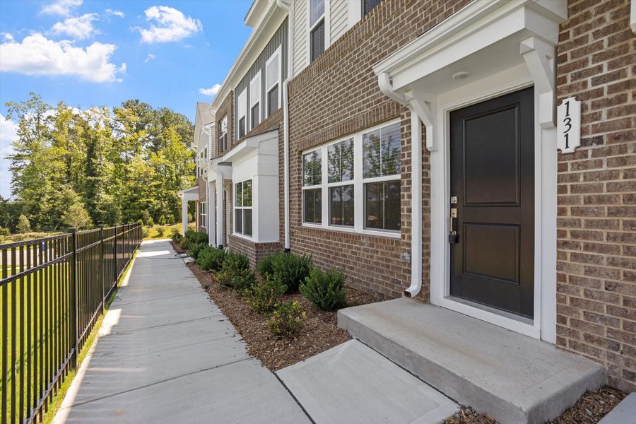 Exterior details and patio area of a home in Renaissance at White Oak, Garner (Image 3).